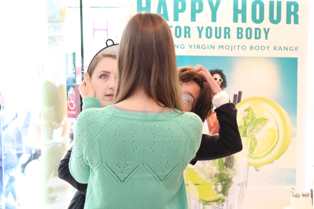 connie making sure the eyebrows are perfect shape